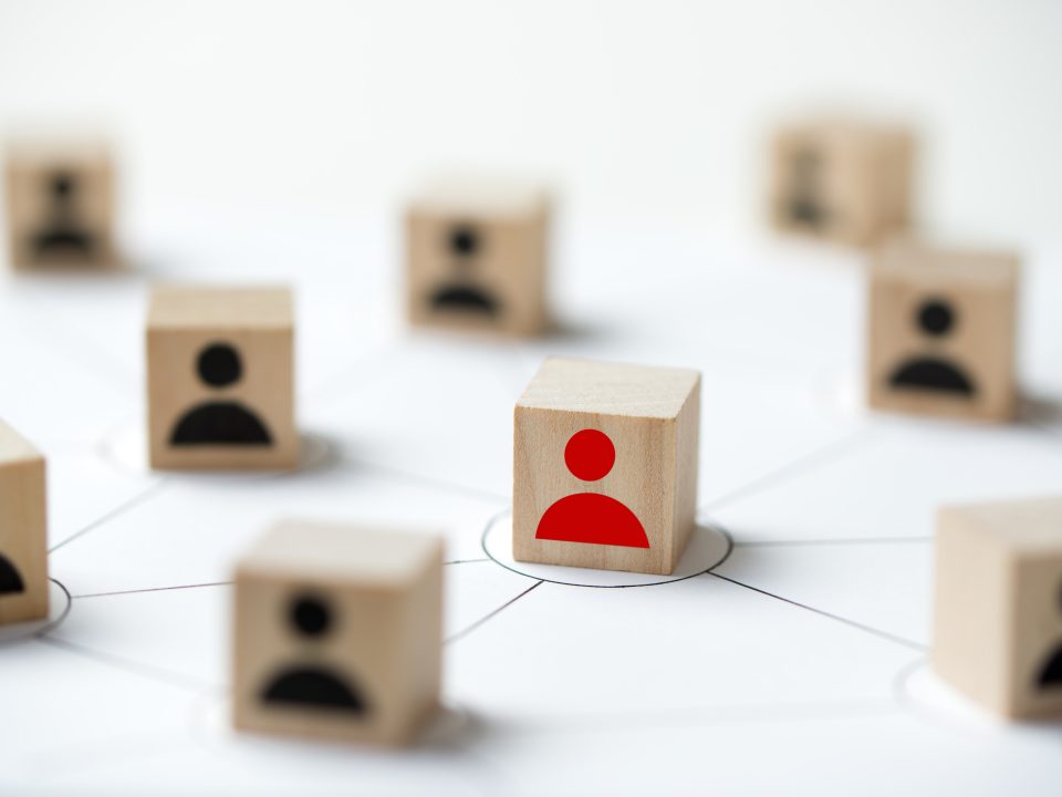 Social media network concept using icon people wooden cube block