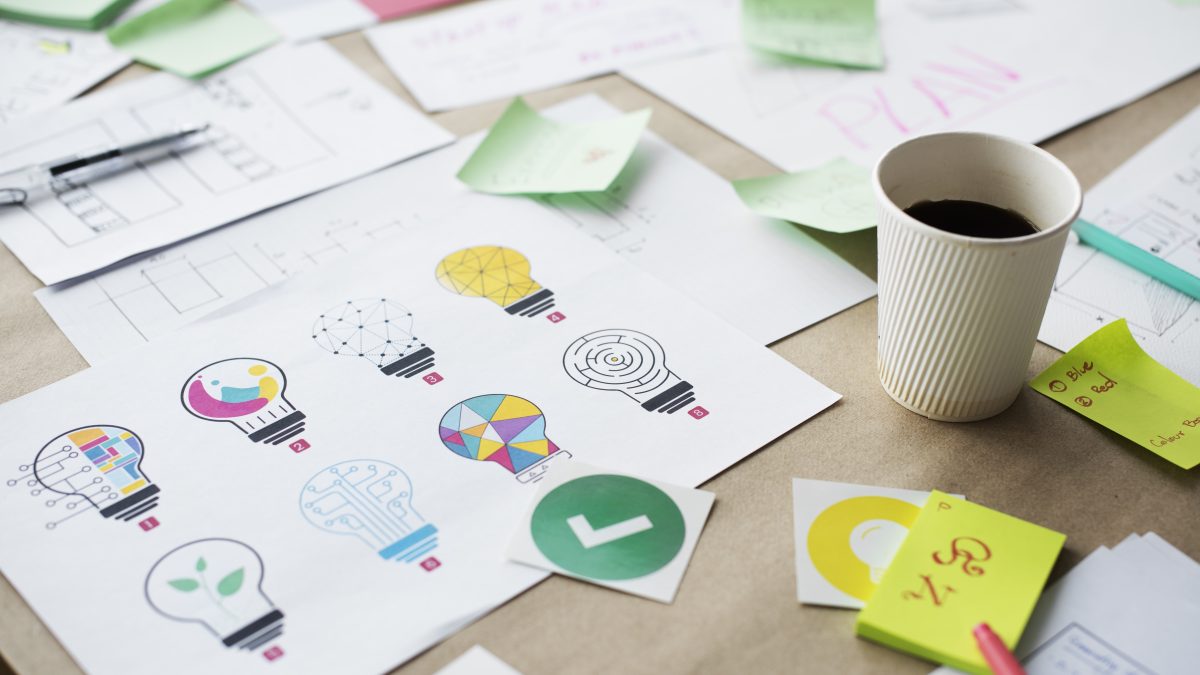 Multi design of light bulb for creative innovation invention ideas on white paper