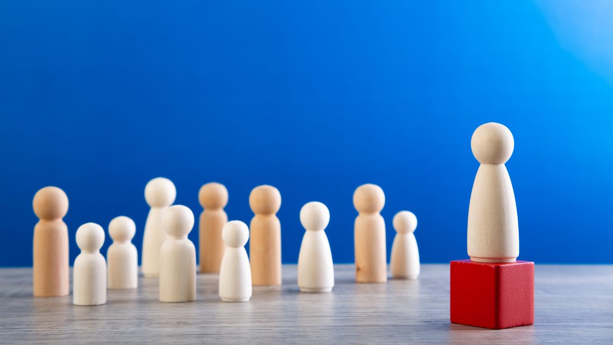 successful team leader, Leader standing out from the crown.