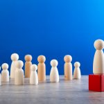 successful team leader, Leader standing out from the crown.