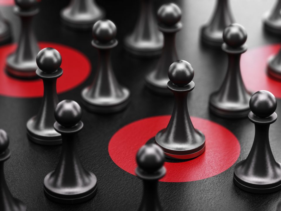 3d illustration of pawns over black background and some of them surrounded by red circles. Targeted individuals and advertising target concept.